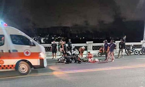 A woman died in a road accident along Davao City Coastal Road around 8:08 p.m. on Tuesday, December 30, 2025, after falling from a motorcycle and being run over by a Yutong bus. The incident occurred when the motorcycle she was riding brushed against a white van that fled the scene, causing the motorcycle to swerve.
