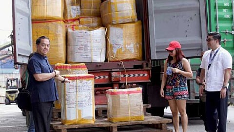 PORT INSPECTION. Bureau of Customs (BOC) Commissioner Ariel Nepomuceno (left) leads the inspection and rollout of abandoned balikbayan boxes in Port Area, Manila on Dec. 18, 2025. The BOC on Friday (Jan. 24, 2026) said it is looking to deliver thousands of abandoned balikbayan boxes to the families of overseas Filipino workers in two months.
