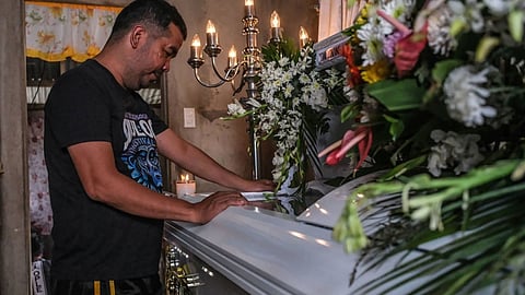 GRIEVING. Bienvenido Ranido is appealing for scholarship aid for his children and burial assistance after his wife, Rowena, was found dead on Friday, Jan. 9, 2026, following the Binaliw landfill collapse on Jan. 8. Ranido, a trash hauler, recounted the sudden landslide that buried the facility where his wife worked as human resources staff.  / 