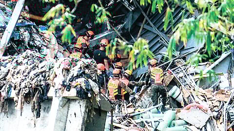 After 20 deaths in Binaliw, 
search for life continues 