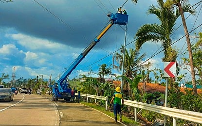 LOANS. Linemen from the Southern Leyte Electric Cooperative perform power restoration activities on Feb. 1, 2021, days after the devastation from Super Typhoon Odette. The National Electrification Administration on Wednesday (Jan. 14, 2026) said it facilitated around PHP2.8 billion worth of loans to electric cooperatives in 2025, a portion of which was used for the restoration of energy infrastructures damaged by Odette. (Photo courtesy of Southern Leyte Electric Cooperative)