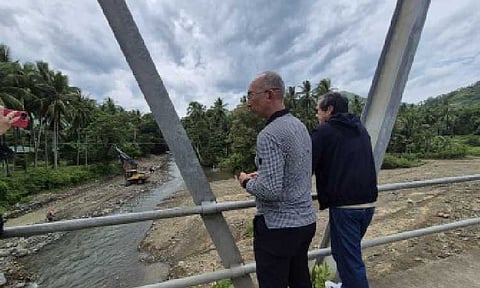 INSPECTION. Former Independent Commission for Infrastructure special adviser and Baguio City Mayor Benjamin Magalong and Public Works Secretary Vince Dizon inspect the PHP96.5-million flood control project in Jose Abad Santos, Davao Occidental, flagged as a ghost project, on Sept. 25, 2025. The Department of Justice on Monday (Jan. 19, 2026) has identified and confirmed that 14 flood control projects are "ghost" or non-existent. (ICI photo)