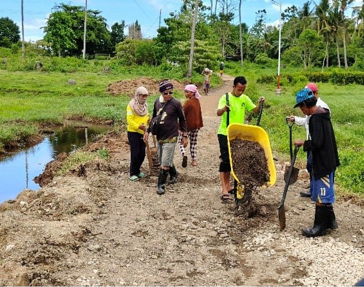 Bohol Community Overcomes Adversity to Complete P2.3-Million Road Project