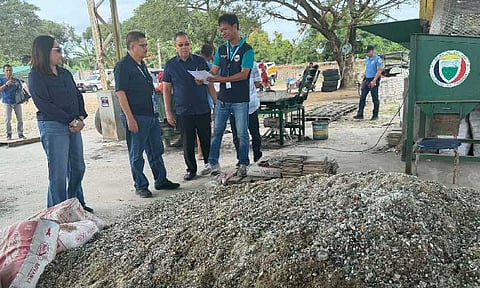MODEL MRF. Sta. Ana Mayor Dinan Labung shows to PENRO Chief Art Punzalan and DILG-Pampanga Director Myra Soriano the town’s materials recovery facility during Tuesday’s inspection. - Princess Clea Arcellaz