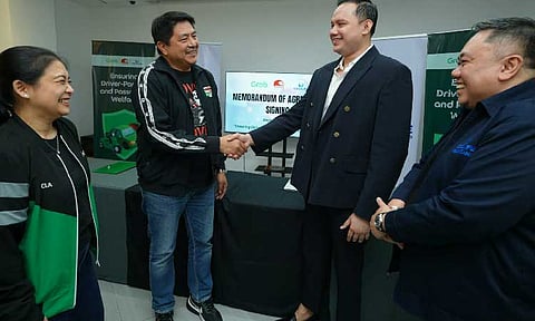 (In photo are, from left, Clarize Morito, Grab Philippines Head of Central Operations; Wayne Jacinto, MOVE IT General Manager; COCOLIFE Healthcare Division Head Atty. Alloysius Yebra; and First Vice President and Head of Sales and Marketing Department Christopher V. Tan following the signing of the memorandum of agreement between the on-demand service platforms and COCOLIFE.)