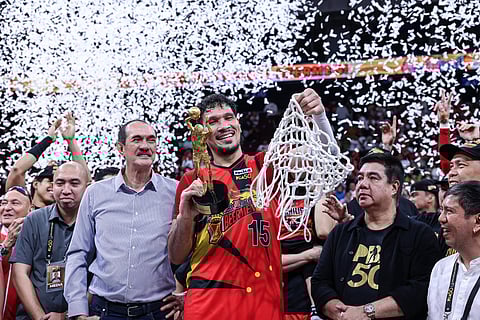FIFTH MVP. June Mar Fajardo celebrates receiving the first Ramon Fernandez PBA Finals MVP trophy for his fifth most valuable player title after the San Miguel Beermen secured the Philippine Cup championship Sunday night, February 1, 2026, before a crowd of 14,201 at the Mall of Asia Arena.