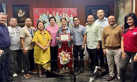 RECOGNIZED. BDO reps and CCAP recognize Barangay Bel-Air officials for helping ward away scammers. (Photo courtesy of BDO)