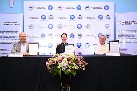 UCHP Program Director Ruben John Basa, Ormoc City Mayor Lucy Torres-Gomez, and Gatchalian Medical Center Chairman Atty. Garney Candelaria sign a memorandum of understanding to boost health care delivery in Geographically Isolated and Disadvantaged Areas.
