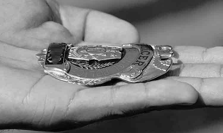 Dead police officer found with blood