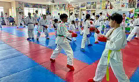 KARATE IN PALARONG PAMBANSA. Karate students train during a sparring session at the Association for the Advancement of Karatedo (AAK) Davao gym in Davao City, as local athletes prepare for expanded competition opportunities following karate’s inclusion as a demonstration sport at the Palarong Pambansa 2026.