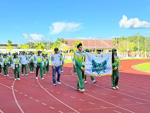 2026 DAVNOR MEET CHAMPS. Athletes of the Santo Tomas Mavericks march into the Davao del Norte Sports and Tourism Complex during the saludo parade of delegations at the opening of the 2026 Davao del Norte Division Meet. Santo Tomas went on to claim the overall championship in the meet, which serves as a qualifier for the 2026 Davraa Meet scheduled for Feb. 22–28.