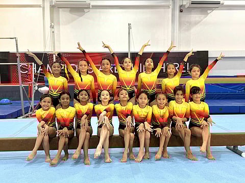 DAVAO PRIDE. Members of School of Champions (SOC) Gymnastics Davao celebrate after winning 47 gold, 25 silver, and 11 bronze medals, producing 19 champions at the 4th LTSA Invitational Gymnastics Games at Rizal Memorial Sports Complex in Manila. The young gym, which opened last year, made a strong debut on the national stage.