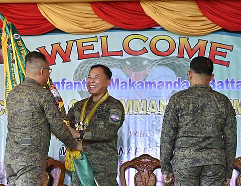 ZAMBOANGA. Lieutenant Colonel Christopher Genzola (left) formally relinquished command of the 35th Infantry Battalion (35IB) to Lieutenant Colonel Romeo Andres (right) in a change of command ceremony at the 35IB headquarters in Tugas village, Patikul, Sulu, on Wednesday, February 11, presided over by Major General Leonardo Peña, 11th Infantry Division commander.
