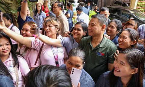 WELLNESS LEAVE. Public school teachers take a selfie with Education Secretary Sonny Angara in this undated photo. The Department of Education (DepEd) on Friday (Feb. 13, 2026) announced the grant of a five-day wellness leave for public school teachers and non-teaching personnel. (Photo courtesy of DepEd)