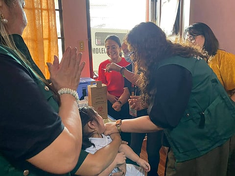 ZAMBOANGA. Department of Health Undersecretary Farwa Hombre administers vaccines when she visited the health center in Sta. Catalina village, Zamboanga City, on Friday, February 13, to monitor the implementation of the Ligtas Tigdas Measles-Rubella Supplemental Immunization Activity (MR-SIA), which was extended until February 20 to raise coverage of the eligible population to 95 percent. 