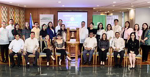 Lynette V. Ortiz, seated from left, Francis Edralin Lim, fifth from left, and Stephanie Marie A. Zulueta, right, lead the February 16, 2026 listing ceremony of Landbank’s ₱50-billion Asenso Bonds, joined by officials from Securities and Exchange Commission (SEC) and Philippine Dealing and Exchange Corp.. The listing opens secondary-market trading, giving investors more flexibility and access.