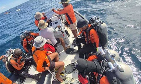 UNDERWATER SEARCH. A technical diving group of the Philippine Coast Guard (PCG) prepares to dive and search the wreckage of the sunken M/V Trisha Kerstin 3 in waters off Baluk-Baluk Island in Basilan on Feb. 12, 2026. PCG divers on Wednesday (Feb. 18) found two more bodies, bringing the total number of confirmed deaths to 64. (Photo courtesy of PCG)