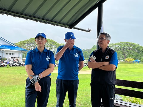 Secretary Leo Tereso Magno, chairperson of the Mindanao Development Authority (MinDA), right graces the ceremonial tee-off of the 77th PAL Interclub senior division at the South Pacific Golf Club Friday, February 20, 2026.