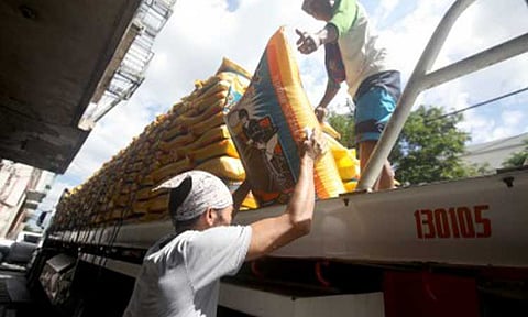 IMPORTED RICE. Workers unload sacks of imported rice in Tondo, Manila on Jan. 23, 2026. The Department of Agriculture on Friday (Feb. 27) said the continuous arrival of imported rice must translate to cheaper retail prices as the Philippines nears the harvest season. (PNA photo by Yancy Lim)