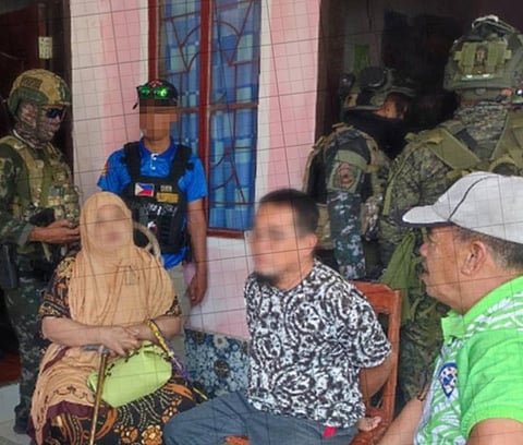 ZAMBOANGA. Lawmen arrest a field commander of the Bangsamoro Islamic Freedom Fighters (BIFF) and his accompanying medic during a Joint Law Enforcement Operation on Friday, February 27, in Bonao village, Tupi, South Cotabato. 