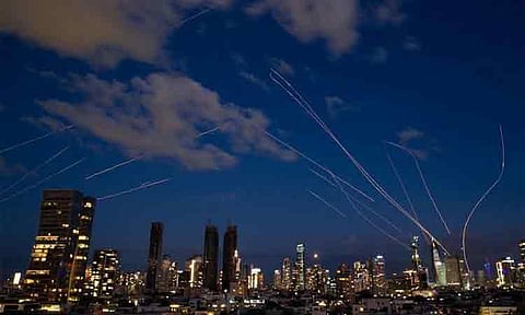 This long exposure photo taken on Feb. 28, 2026 shows flare trails of the interceptor missiles launched from Israeli air defense systems in Tel Aviv, Israel. The United States and Israel on Saturday, February 28, 2026, launched "major combat operations" against Iran, plunging the war-torn Middle East into a new round of violent conflicts.