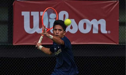 FIRST CHAMPION. Ariel Cabaral of National University Nazareth School makes a forehand return to Rafael Lagac of Ateneo de Manila University in the boys' singles finals of the UAAP Season 88 tennis tournament at Colegio San Agustin in San Jose del Monte, Bulacan on Sunday (March 1, 2026). Cabaral won, 2-6, 7-6 (1), 6-3, to snare the inaugural title. (UAAP photo)
