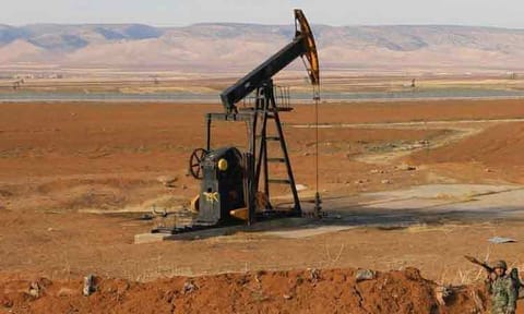 A Syrian soldier is seen in an oil field in the countryside of Qamishli, northeastern Hasakah province, Syria, on November 5, 2019.