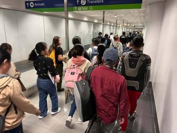 HOMEWARD BOUND. A total of 57 overseas Filipino workers bound for Abu Dhabi safely returned to Manila early Monday, March 2, 2026, after being stranded at the Hong Kong International Airport.
