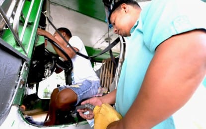 FARE HIKE. A jeepney driver refuels at a gas station in Quezon City in this photo taken on Oct. 28, 2025. Acting Secretary Giovanni Lopez on Wednesday (March 11, 2026) confirmed plans to implement a fare hike for public utility vehicles, with the amount still being studied by the Land Transportation Franchising and Regulatory Board. (PNA file photo)