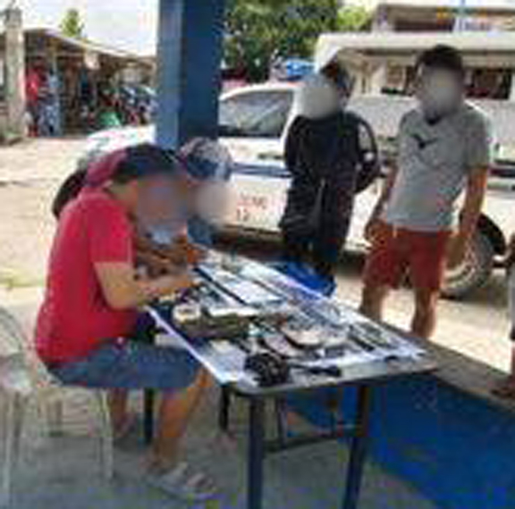 
ZAMBOANGA. Policemen arrest two high-value individuals (HVIs) and seize some P350,200 worth of illegal drugs in an anti-drug operation on Friday, March 13, at a waiting shed in Glamang village, Polomolok, South Cotabato. 