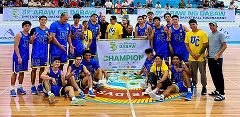 UC RULES ARAW NG DABAW BASKETBALL. The University of Cebu (UC) celebrates after defeating San Pedro College (SPC), 76-59, to win the 89th Araw ng Dabaw Invitational Basketball Tournament at the Davao City Recreation Center on Sunday, March 15.