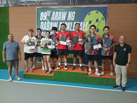 NOVICE WINNERS. Brothers James Robert Sy and Ralph Robert Sy of Mati City, center, pose with fellow medalists during the awarding ceremony of the novice division in the 89th Araw ng Dabaw Pickleball Championships on Sunday, March 15, at Picklehive in Davao City.