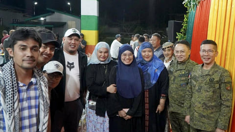 ZAMBOANGA. Brigadier General Emmanuel Cabasan, commander of the 1103rd Infantry Brigade (right) and his deputy, Colonel Abdelhalim Sakilan 92nd from right), grace the 58th founding anniversary celebration of the Moro National Liberation Front and Grand Iftar on Wednesday, March 18, in Sitio Mabuhot, Pasil village, Indanan, Sulu. 