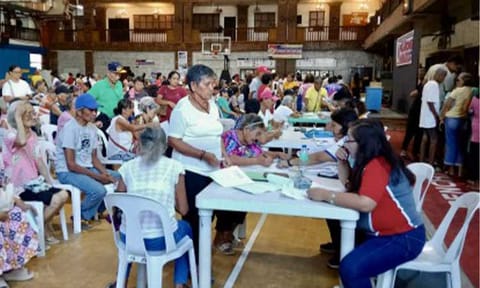 SOCIAL PENSION. Senior citizens from Laoag City, Ilocos Norte receive PHP3,000 each under the Social Pension for Indigent Senior Citizens at Laoag City multi-purpose hall on Oct. 21, 2025. The Department of Social Welfare and Development on Monday (March 23, 2026) said indigent senior citizens may still use other government-issued identification cards when claiming their social pension. (Contributed photo)