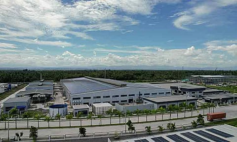 In this aerial photo, Head Sport occupies the foreground of the industrial site, covering about five hectares, while a Thai Coco facility rises under construction at the far right in Davao del Norte.