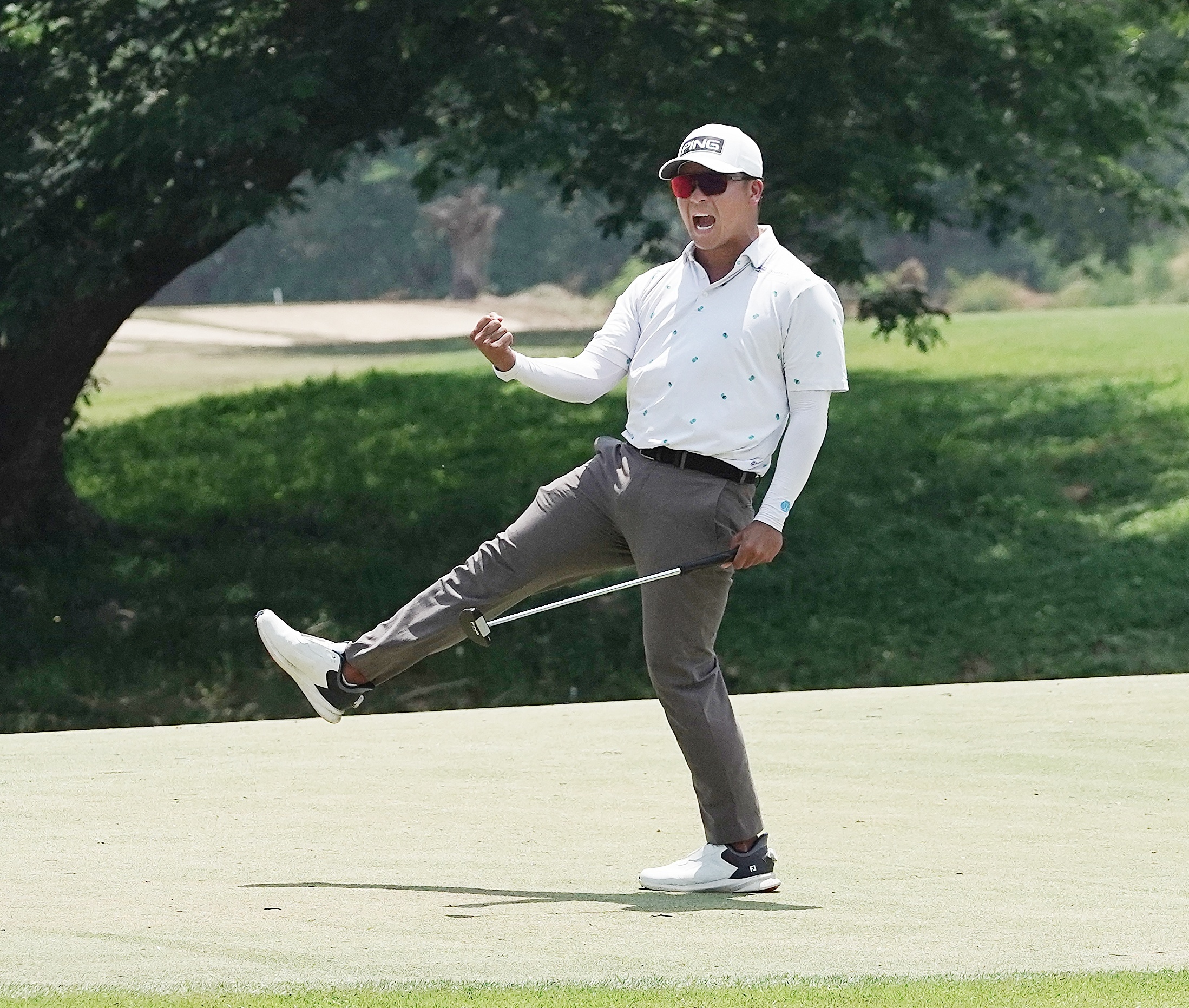 Justin Quiban celebrates after sinking an eagle putt on the 18th hole to clinch the ICTSI Lakewood Championship in Cabanatuan City on Friday, March 27, 2026, edging Ha Taewon to cap a wire-to-wire title victory.
