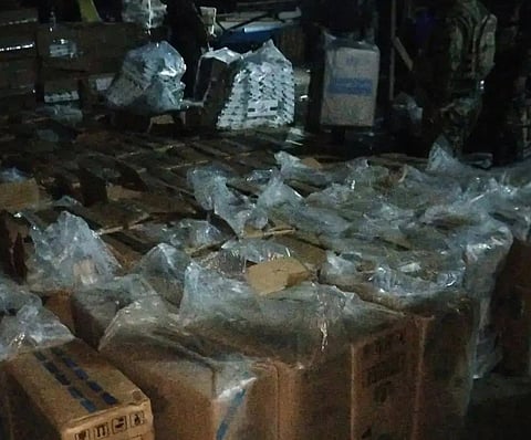 ZAMBOANGA. Policemen seize some P12.8 million worth of smuggled cigarettes in a law enforcement operation on Wednesday, March 25, in Bunkhouse village, Malabang, Lanao del Sur. 