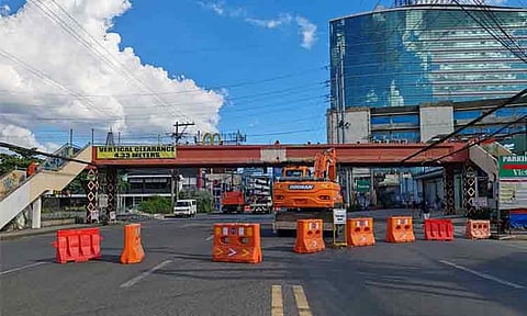 Personnel from the Department of Public Works and Highways (DPWH) Davao City Engineering Office continues to conduct  the partial demolition of a dilapidated pedestrian overpass on Good Friday, April 3, 2026, located in front of the former NCCC Mall VP along JP Laurel Avenue, Davao City.
