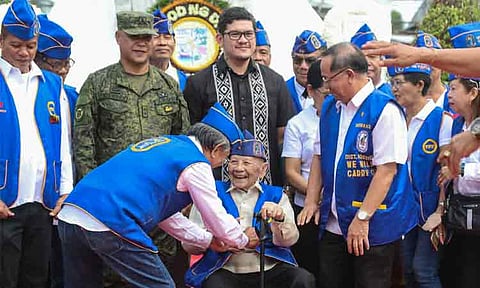 CENTENNIAL WAR HERO. In this file photo, veteran soldier Teofilo Gamutan, in a wheelchair, attends the wreath-laying ceremony for the Araw ng Kagitingan in Davao City on Monday morning, April 10, 2023, at the Veteran's Monument at the junction Roxas Avenue-Ponciano Reyes Street. Gamutan, one of the city’s oldest veterans, died last week on Good Friday, April 3, 2026. He was 101.