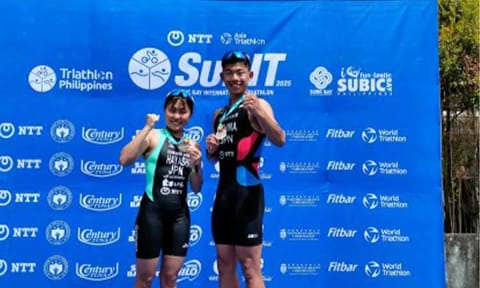 SWEEP. Japan's Manami Hayashi (left) and Takuto Oshima dominate the elite category of the Subic International Triathlon on May 4, 2025 at Subic Bay Metropolitan Authority Freeport Zone in Zambales. Hayashi won the women's title while Oshima ruled the men's division. (PNA file photo by Jean Malanum)