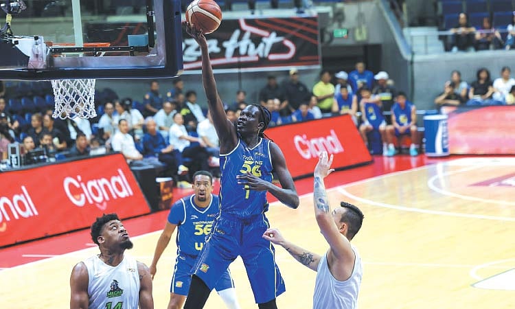 Bol Bol Powers TNT Past Macau Black Knights 119-112 in PBA Commissioner's Cup
