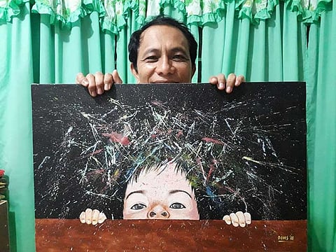 LEYTE. Tacloban artist and educator Doms Pagliawan shows his artwork. (Photo courtesy of Doms Pagliawan)
