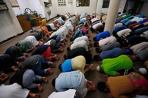 Muslim-Filipinos pray during the holy month of Ramadan.