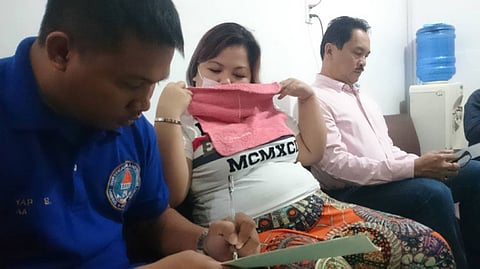 CEBU. Members of the CIDG and the Philippine Dental Association arrested a Karen Sombilon Bucog for allegedly performing dental procedures without license. (Kevin Lagunda)