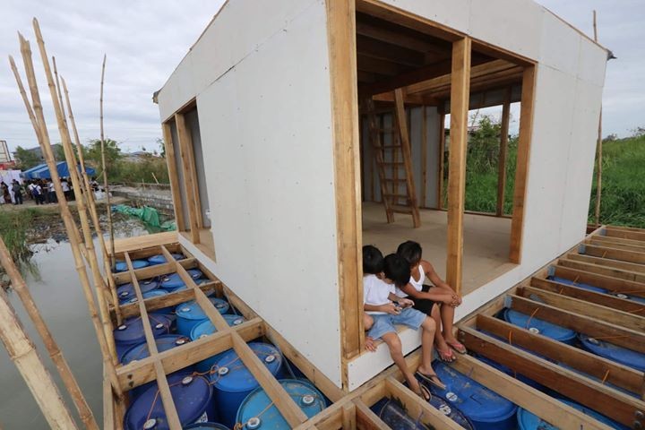 PAMPANGA. Kids try out the floating house in Barangay Sto. Rosario, a pilot project of Finch Floating Homes in cooperation with the local government of Macabebe. (Chris Navarro)