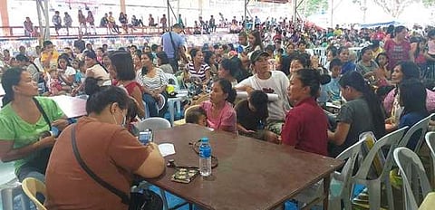 NEGROS. Hundreds of residents avail themselves of the services of the medical mission held at the auditorium of Isabela town. (Contributed photo)