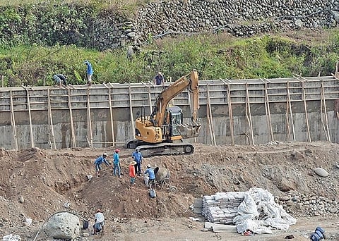 CORDILLERA. Workers build a retaining wall for the Chico River in Bontoc, Mountain Province in this file photo taken in May 2018. (SunStar Baguio File Photo)
