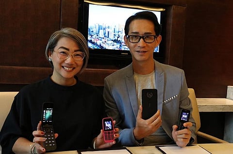 PRODUCT LAUNCH. HMD Global senior business manager Charlotte Koa and Sancho Chak, the company's general manager for Philippines, Hong Kong and Macau, show the new Nokia mobile phones during their launching at the Radisson Blu Hotel in Cebu City on Thursday, Sept. 19, 2019. (SunStar photo / Amper Campaña)