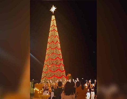 PAMPANGA. A 35-feet tall Christmas tree outside Royce Hotel and Casino paints the sky with bright colors. (Charlene A. Cayabyab)