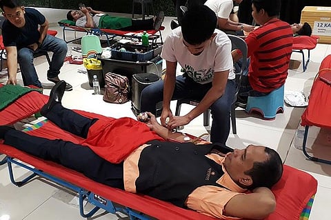 CAGAYAN DE ORO. Donors, mostly men, join the Blood Donation Drive conducted by the Philippine Red Cross at two SM malls in Cagayan de Oro City. (Photo by Jo Ann Sablad)